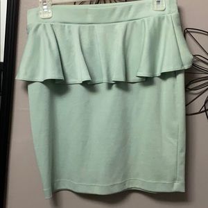 Mint green peplum mini skirt